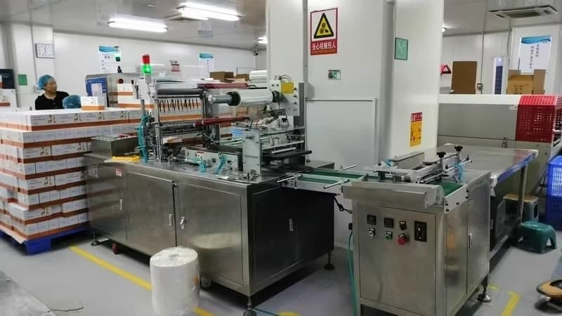 Automatic capsule filling machine running a batch of two-piece supplement capsules